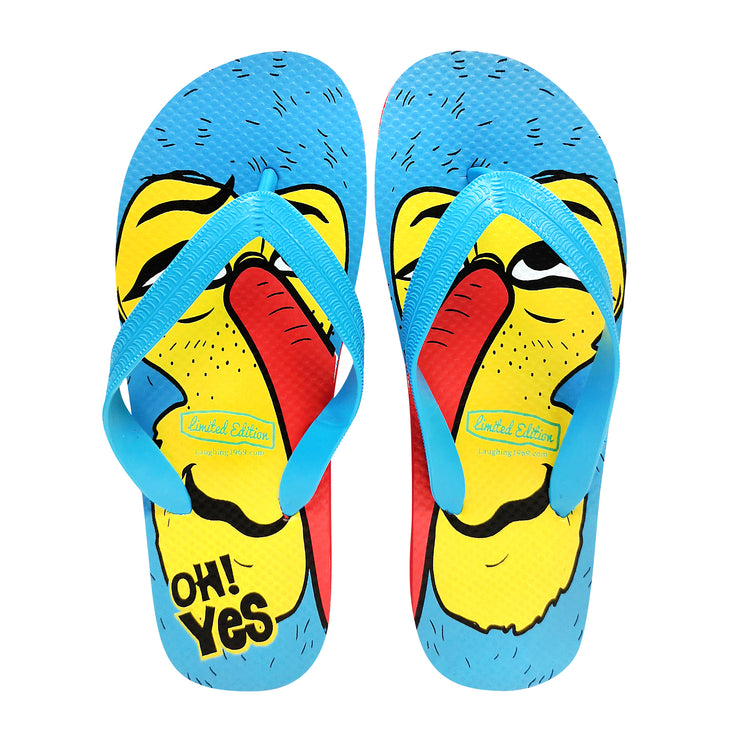 An overhead angle view of pair of sky blue colour flip-flops with a printed art design of a cartoon proboscis monkey showing a happy “Oh Yes!” facial expression